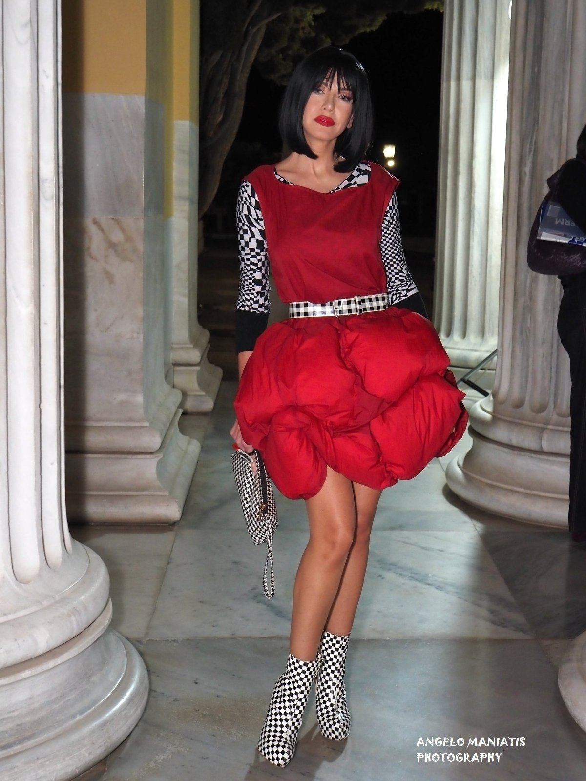 Red balloon dress with checkerboard sleeves and boots