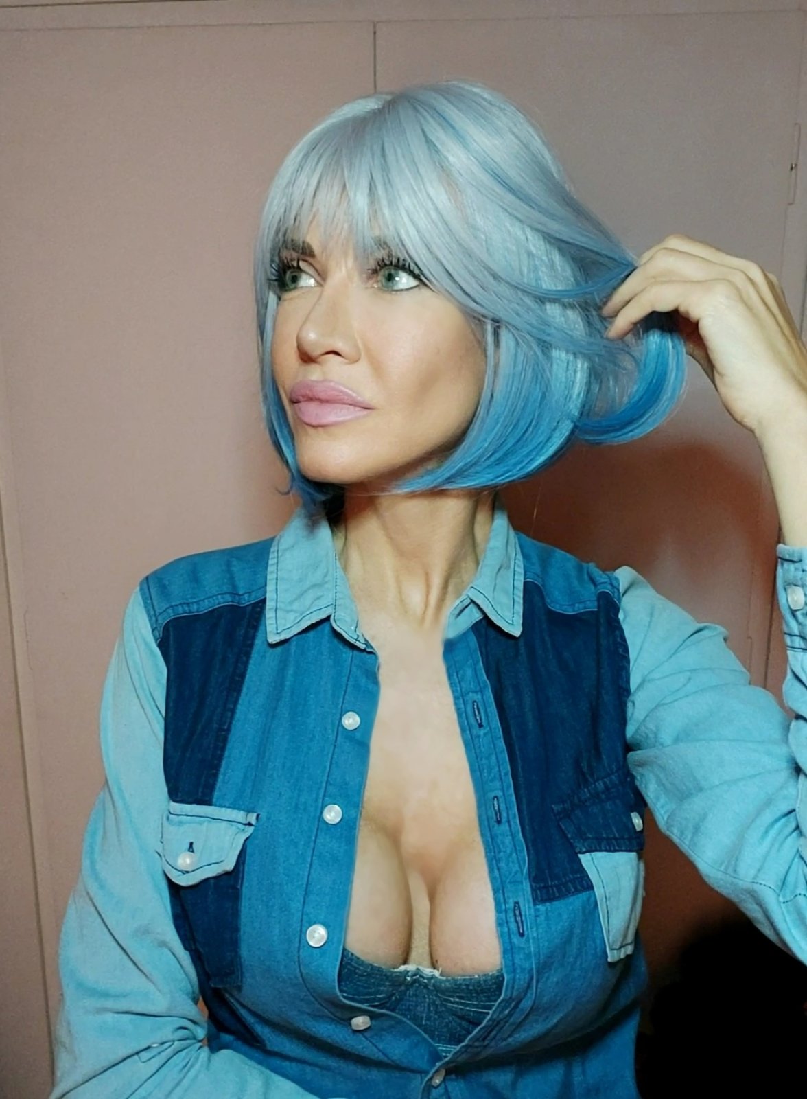 Ice blue bob with layered denim styling
