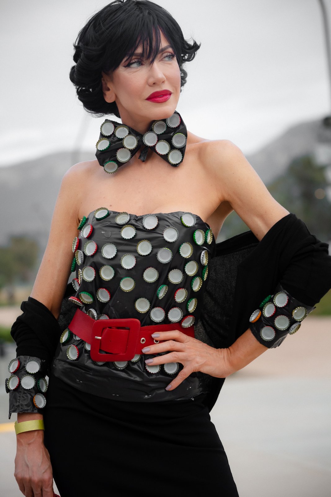 Bottle-cap bustier with matching bow tie and red belt